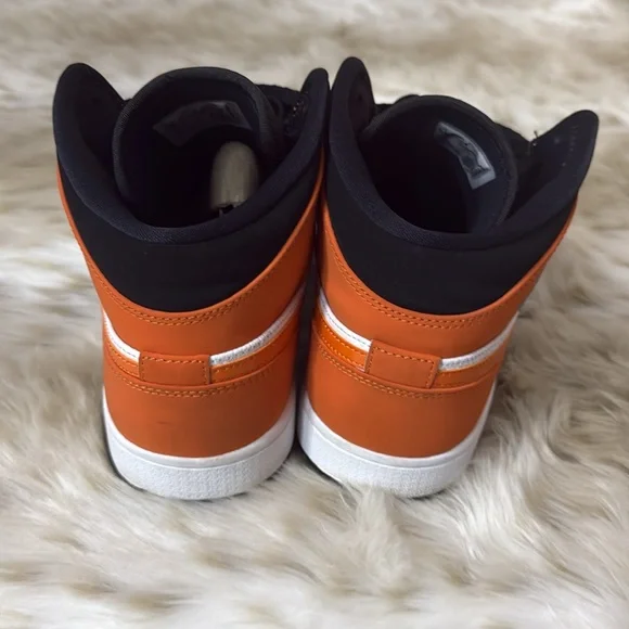 Air Jordan Black and Orange Sneakers